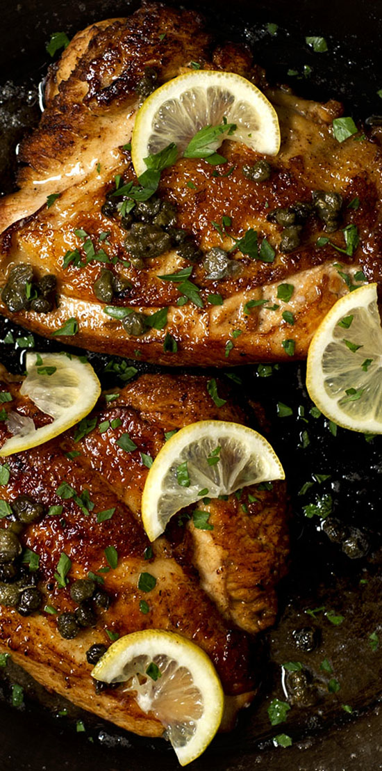 Close up of cooked Chicken and lemon.